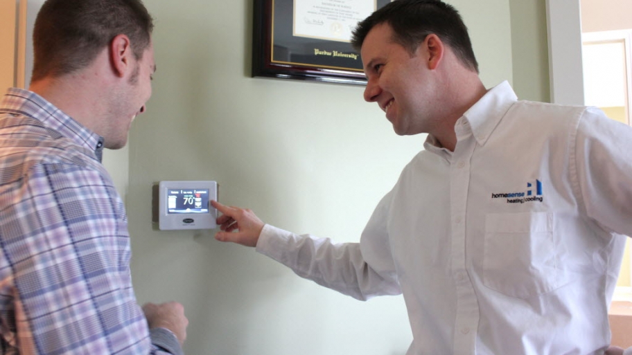 HVAC tech and homeowners